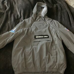Reflective in light. Members only jacket.
